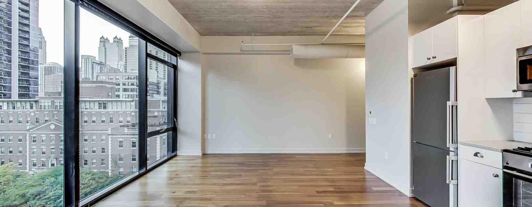 luxury warehouse apartment interior high ceilings exposed brick - Luxury warehouse apartments