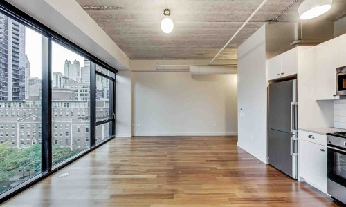 luxury warehouse apartment interior high ceilings exposed brick - Luxury warehouse apartments